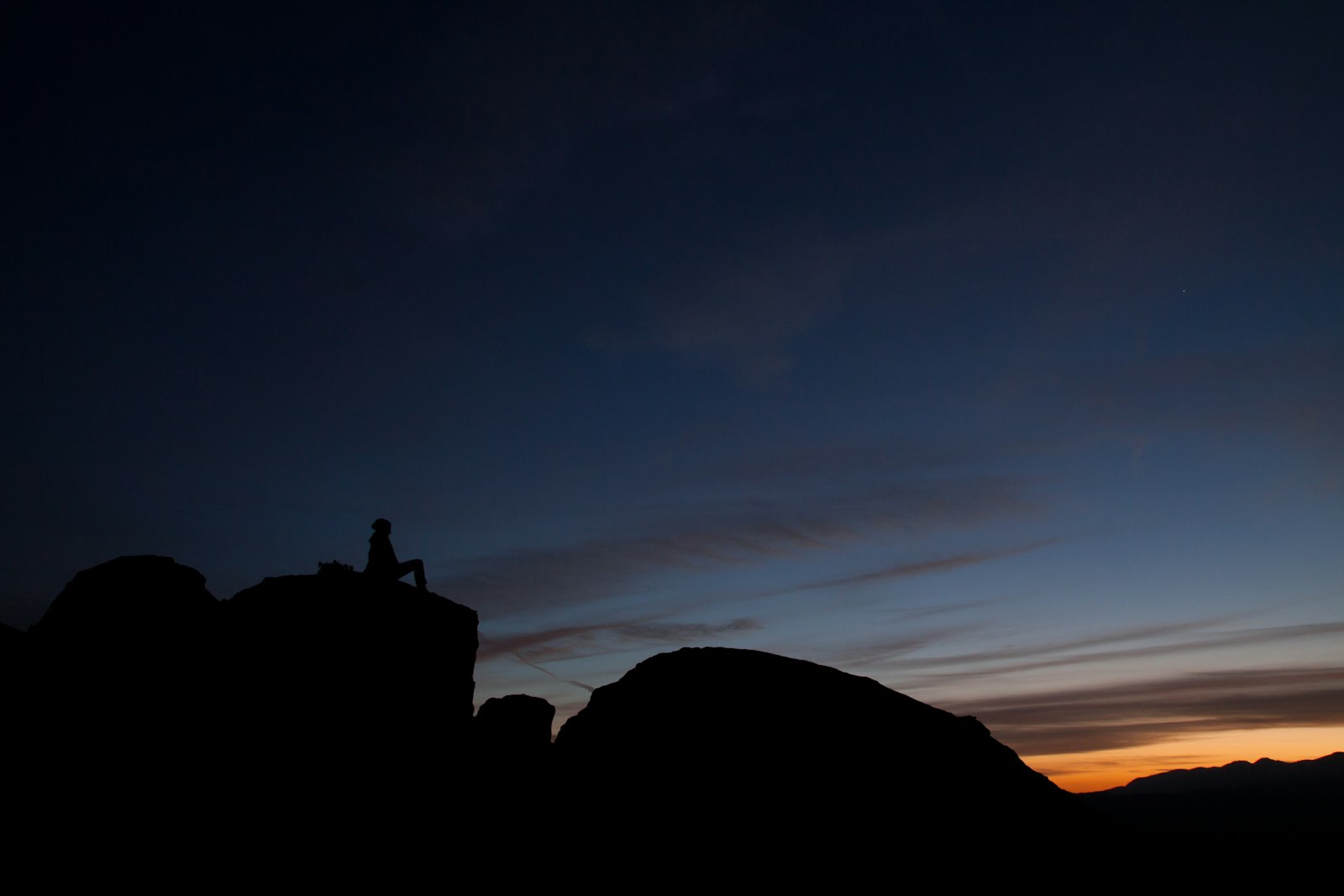 Canon EOS 50D sample photo. Silhouette of person sitting photography