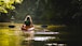 woman on kayak on body of water holding paddle