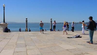 Tourists enjoying the melodic waves of the Sea Organ along Zadar’s waterfront.