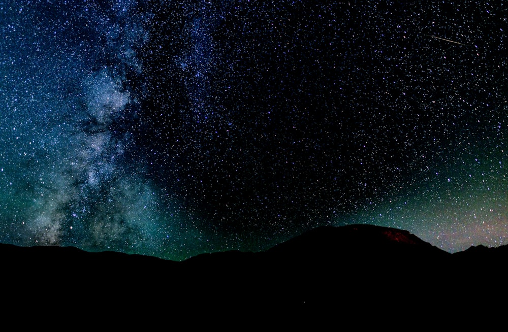 mountain under starry nights