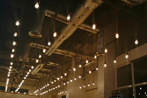 Cozy basement transformation featuring updated HVAC and lighting solutions from our partners