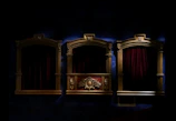 A collection of aged theater tickets and programs artistically arranged on a dark velvet backdrop