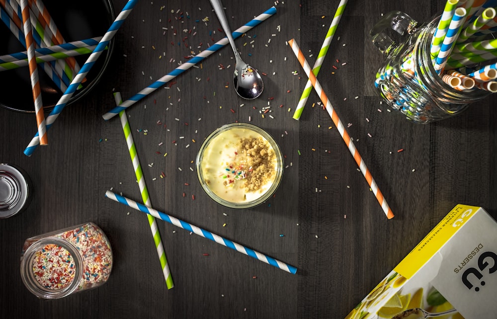 Party straws and candy desserts.