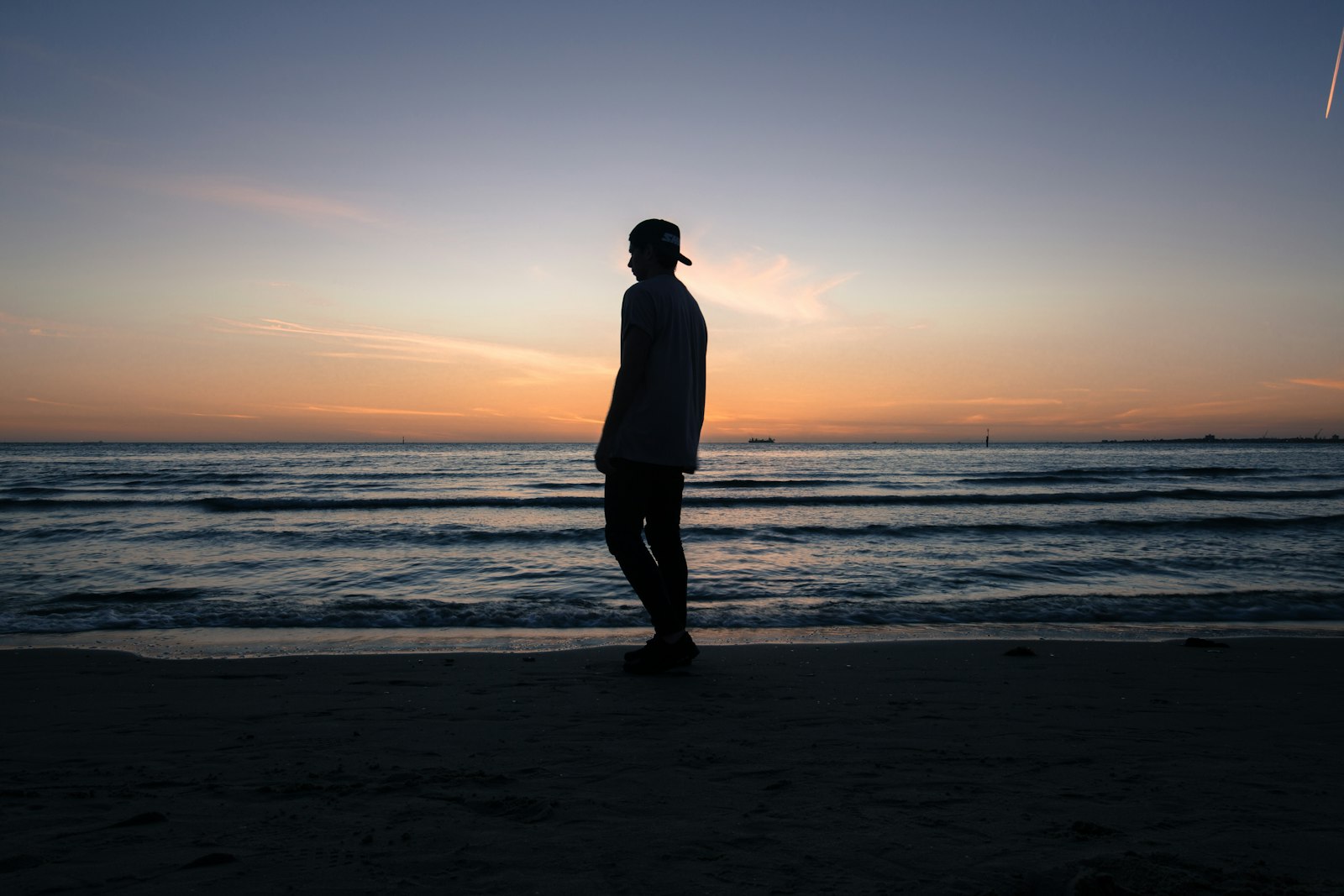 Canon EOS 6D + Sigma 24mm F1.4 DG HSM Art sample photo. Man standing on beach photography