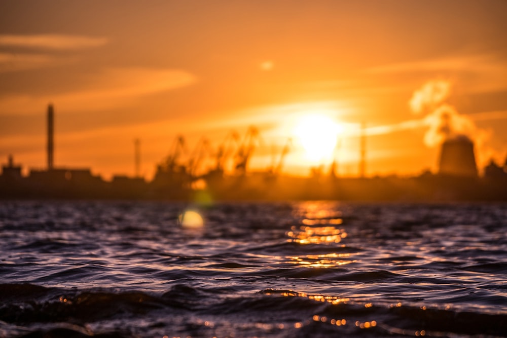 body of water during golden hour