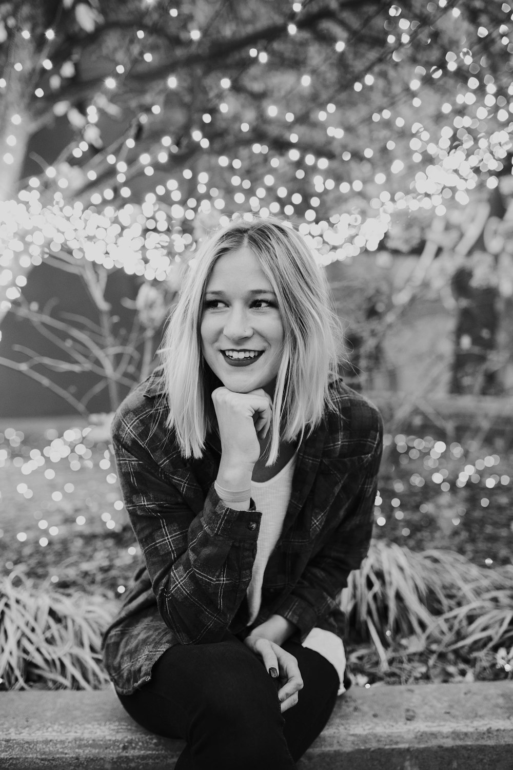 grayscale photography of woman wearing plaid sport shirt