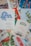 A collection of vintage Christmas cards displaying festive designs including holly, candles, snow scenes, and greetings written in elegant typography. The cards are arranged in a slightly overlapping manner, showcasing their intricate artwork and holiday themes.