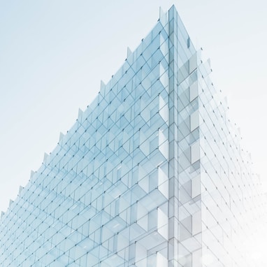 glass building under clear blue sky
