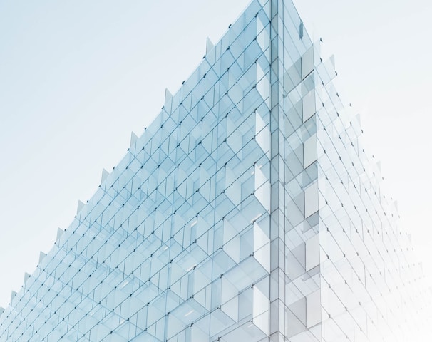 glass building under clear blue sky