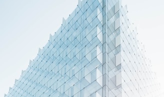 glass building under clear blue sky