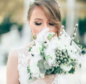 bride smelling the flowers