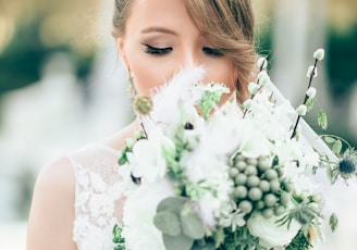 bride smelling the flowers