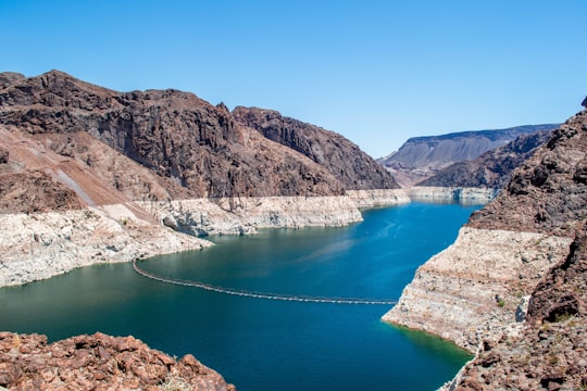 rocky mountain near body of water in Lake Mead National Recreation Area United States