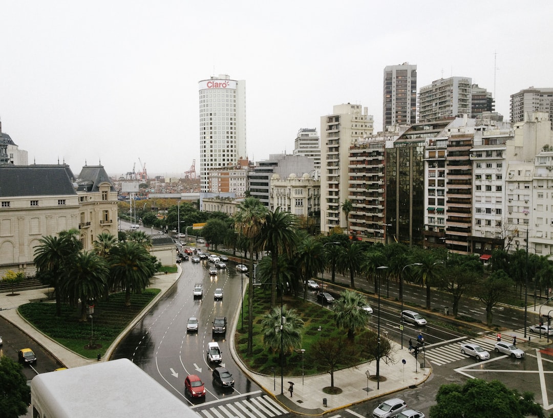 aerial photography of buildings and vehicles on road