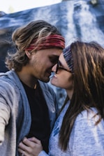 man and woman about to kiss each other