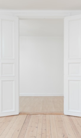 minimalist photography of open door