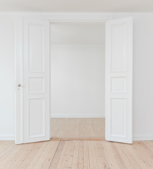 minimalist photography of open door