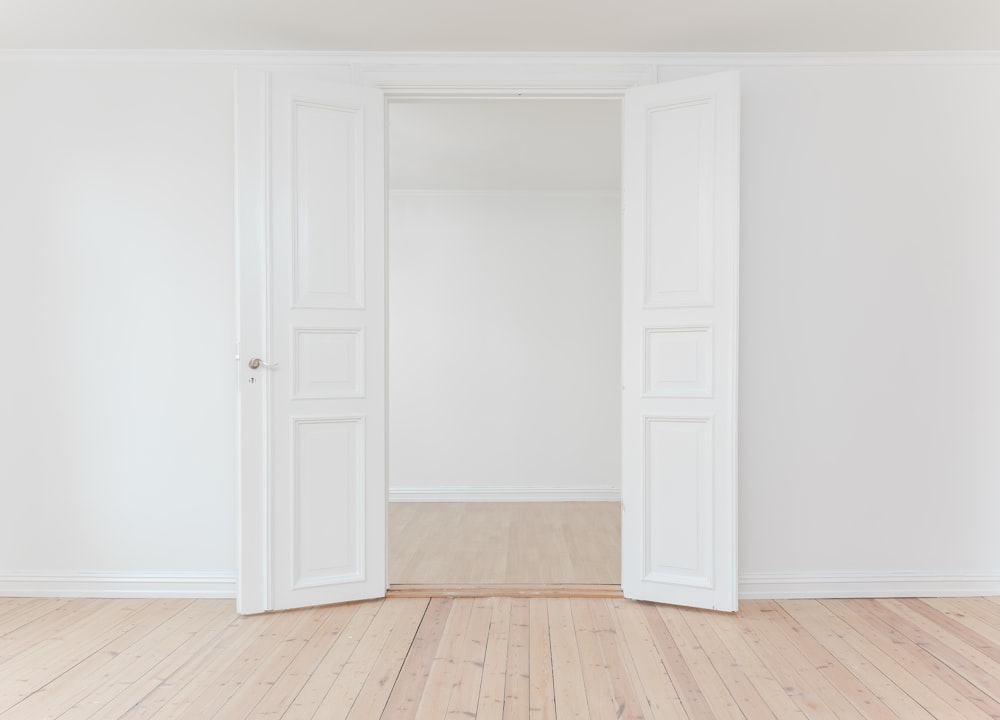 minimalist photography of open door