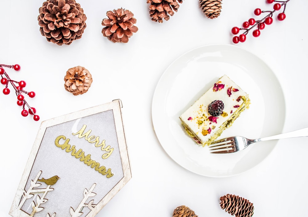 sliced cake surrounded by pinecone