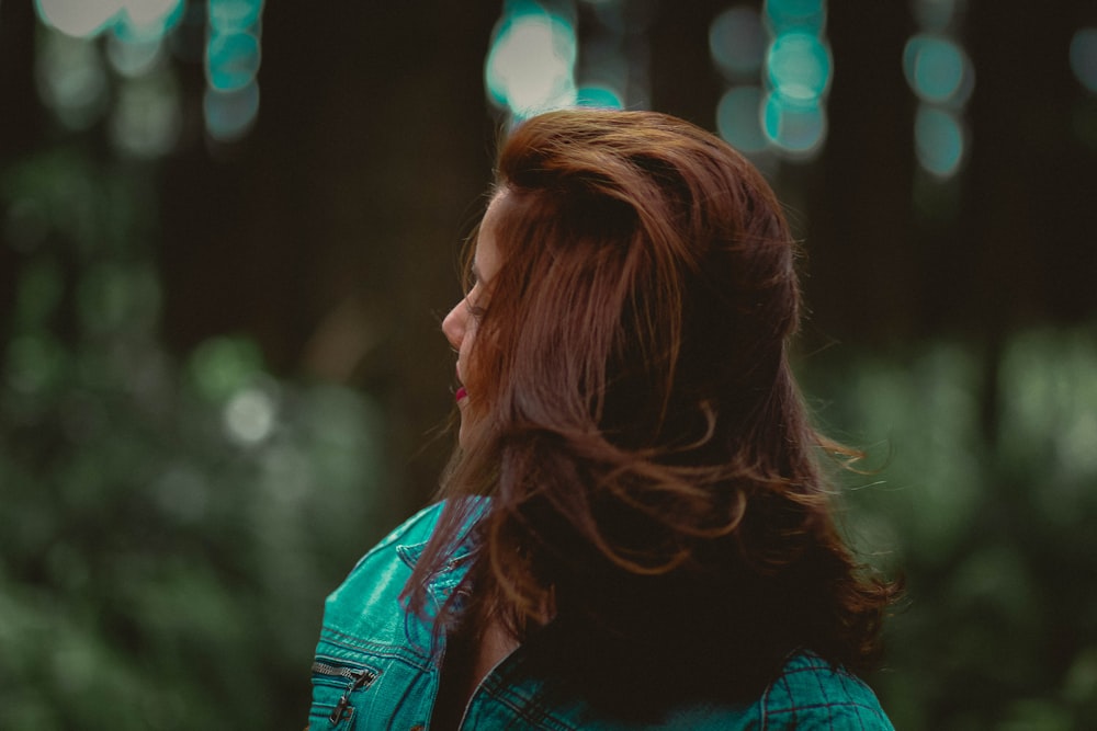 woman in blue plaid shirt in macro photography