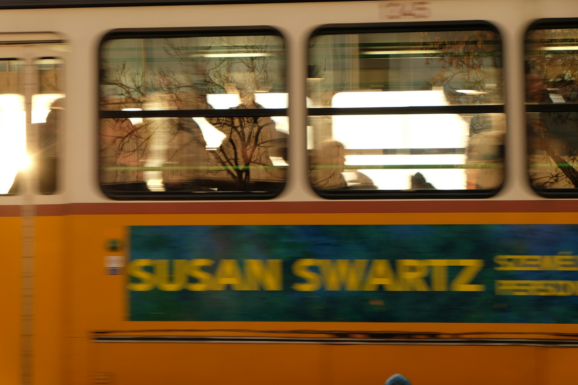 woman wearing yellow long-sleeved dress under white clouds and blue sky during daytime