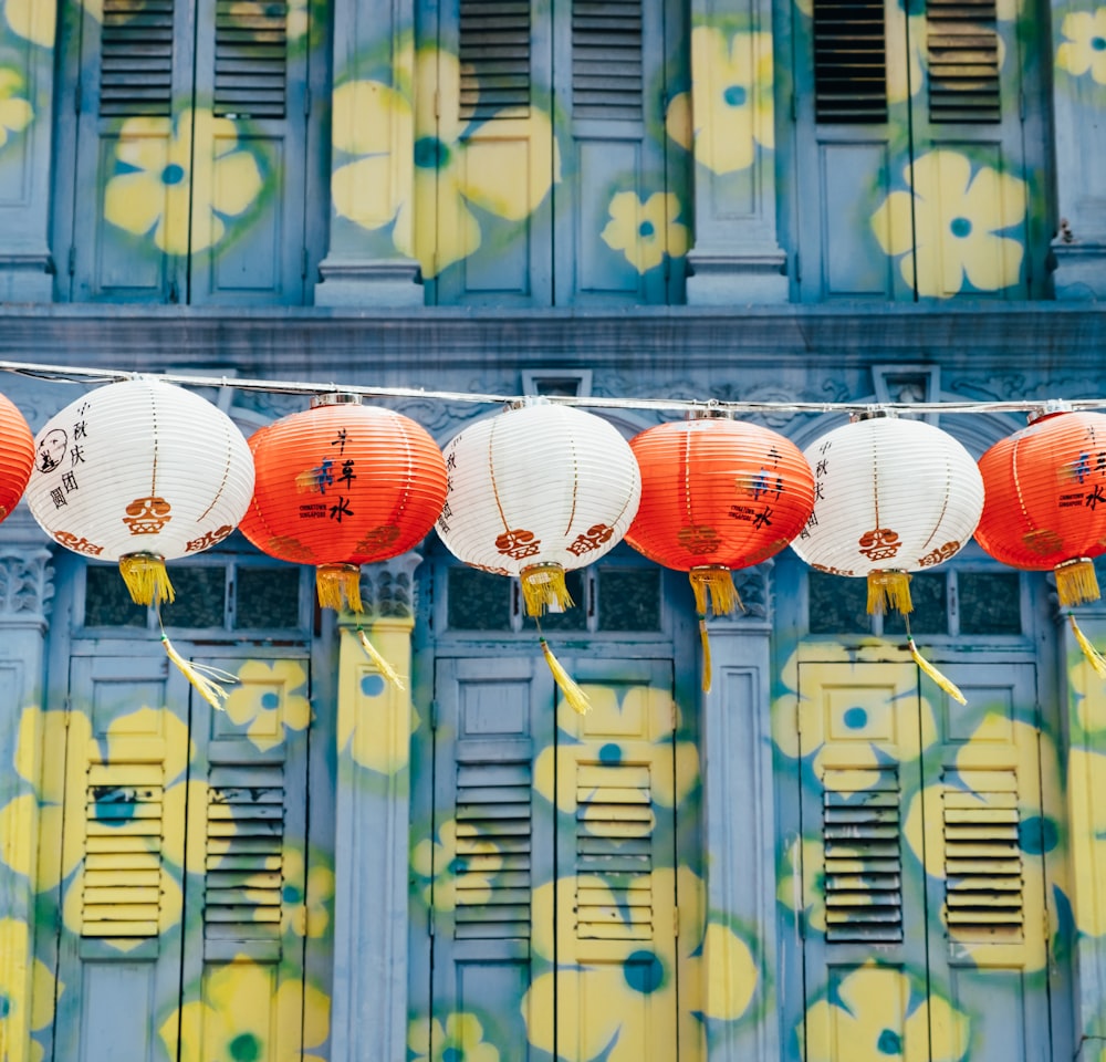 Chinese lantern hanging near windows