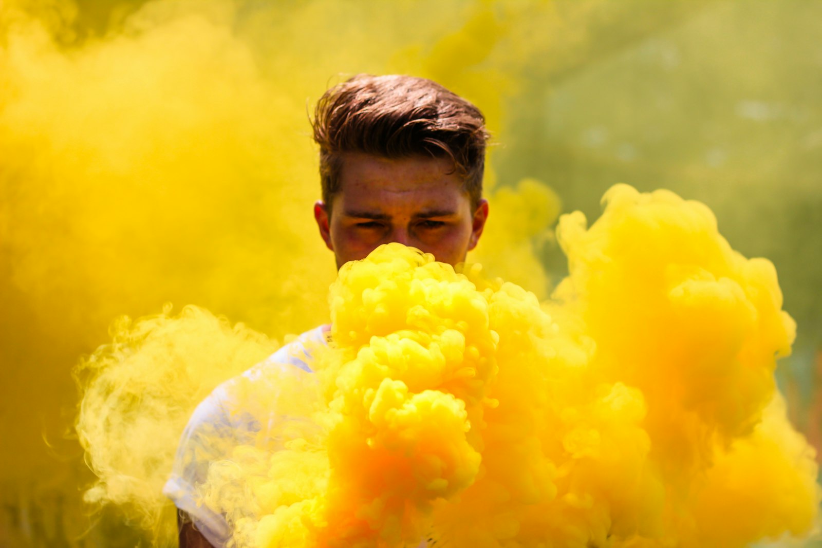 Canon EF 50mm f/1.8 sample photo. Man hiding in smoke photography