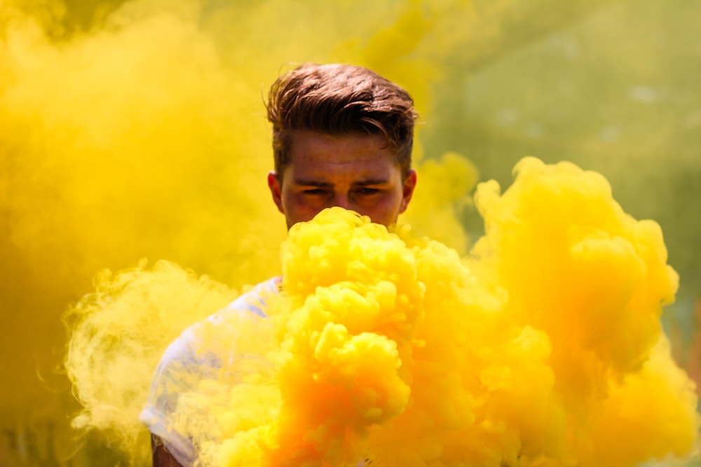 man hiding in smoke