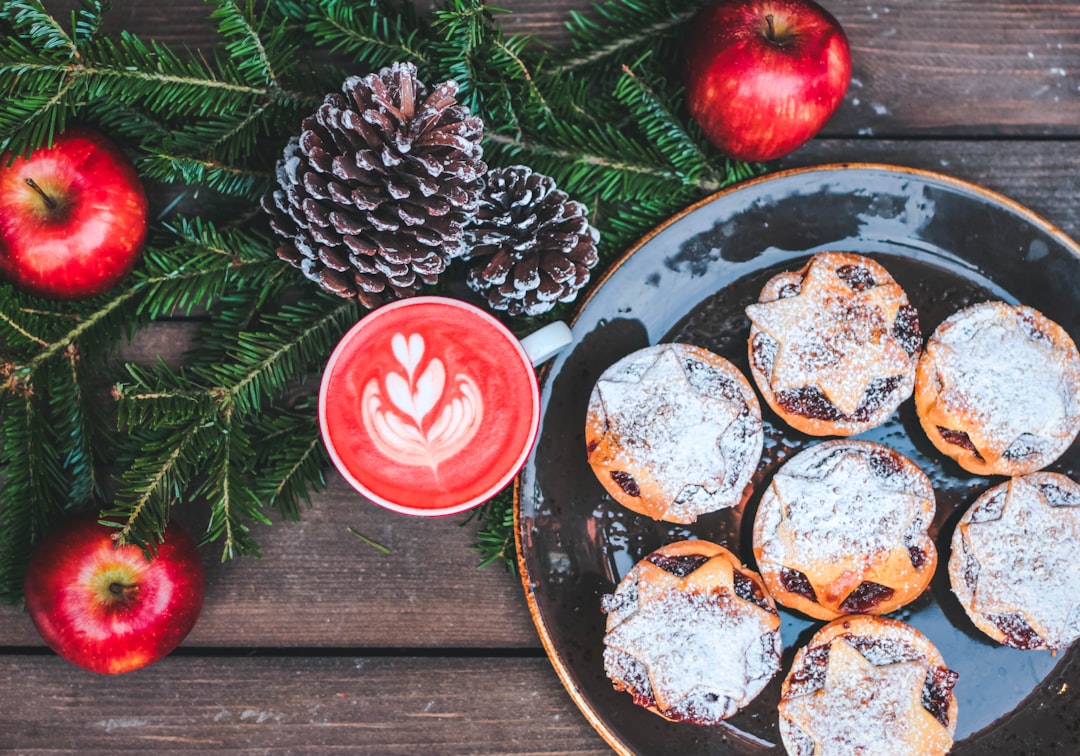 sweet pastries on black ceramic plate, Red Velvet cappuccino