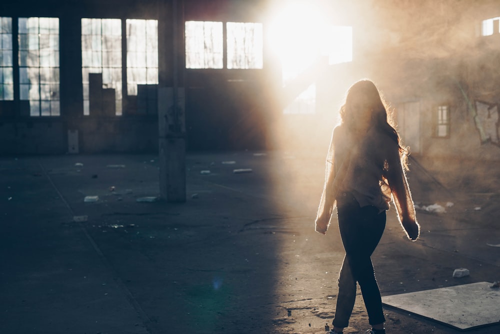 woman walking near the building