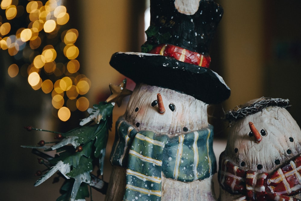 shallow focus photo of snowman figurines