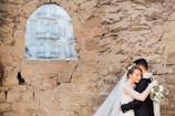 man and woman hugging each other
