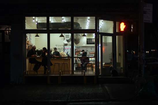 A welcoming cafe environment with diverse individuals interacting.