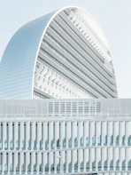 mirrored building under blue sky