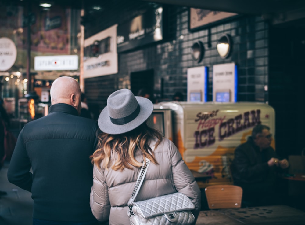 man and woman facing Ice Cream truck