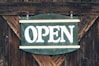 green and white open signage