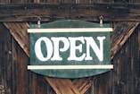 green and white open signage
