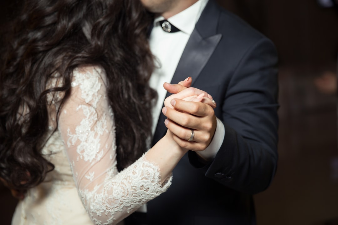 man and woman dancing wearing casual dresses. Mastering the Perfect Wedding Day Timeline