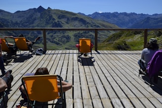 A group of diverse guests enjoying a vacation rental with scenic views.