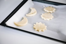 raw cookies on baking sheet