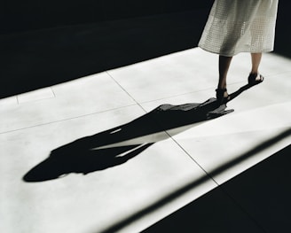 woman walking with shadow