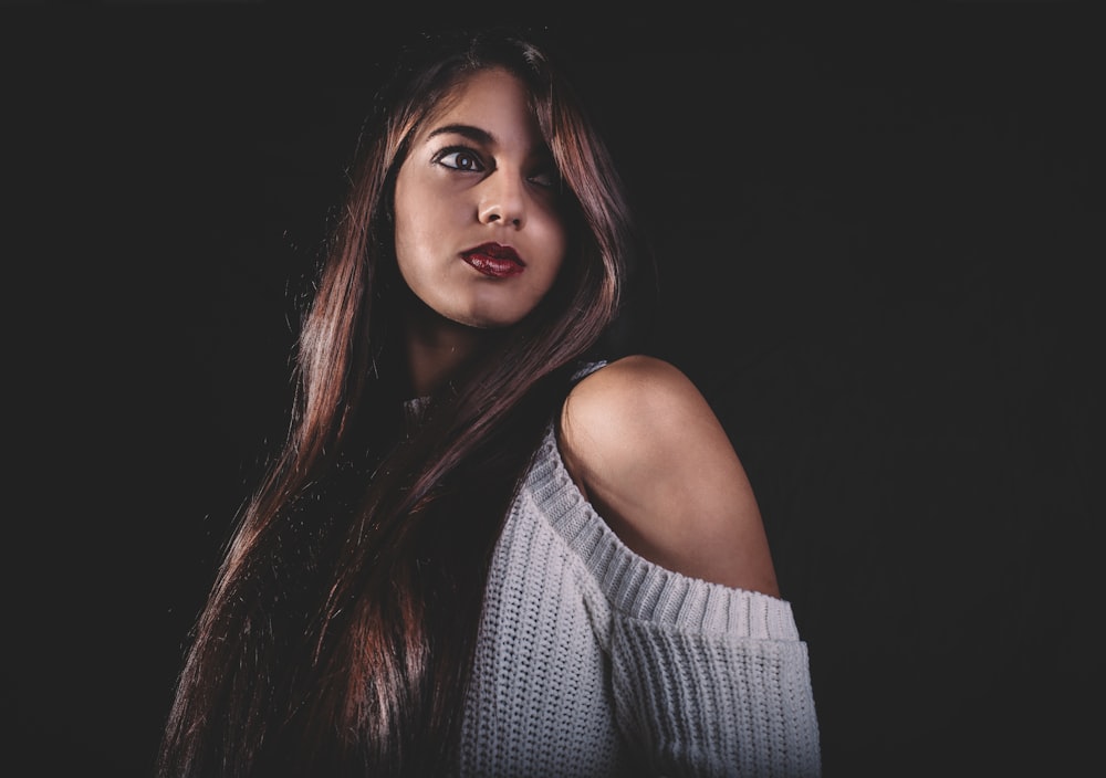 selective focus of woman wearing white top