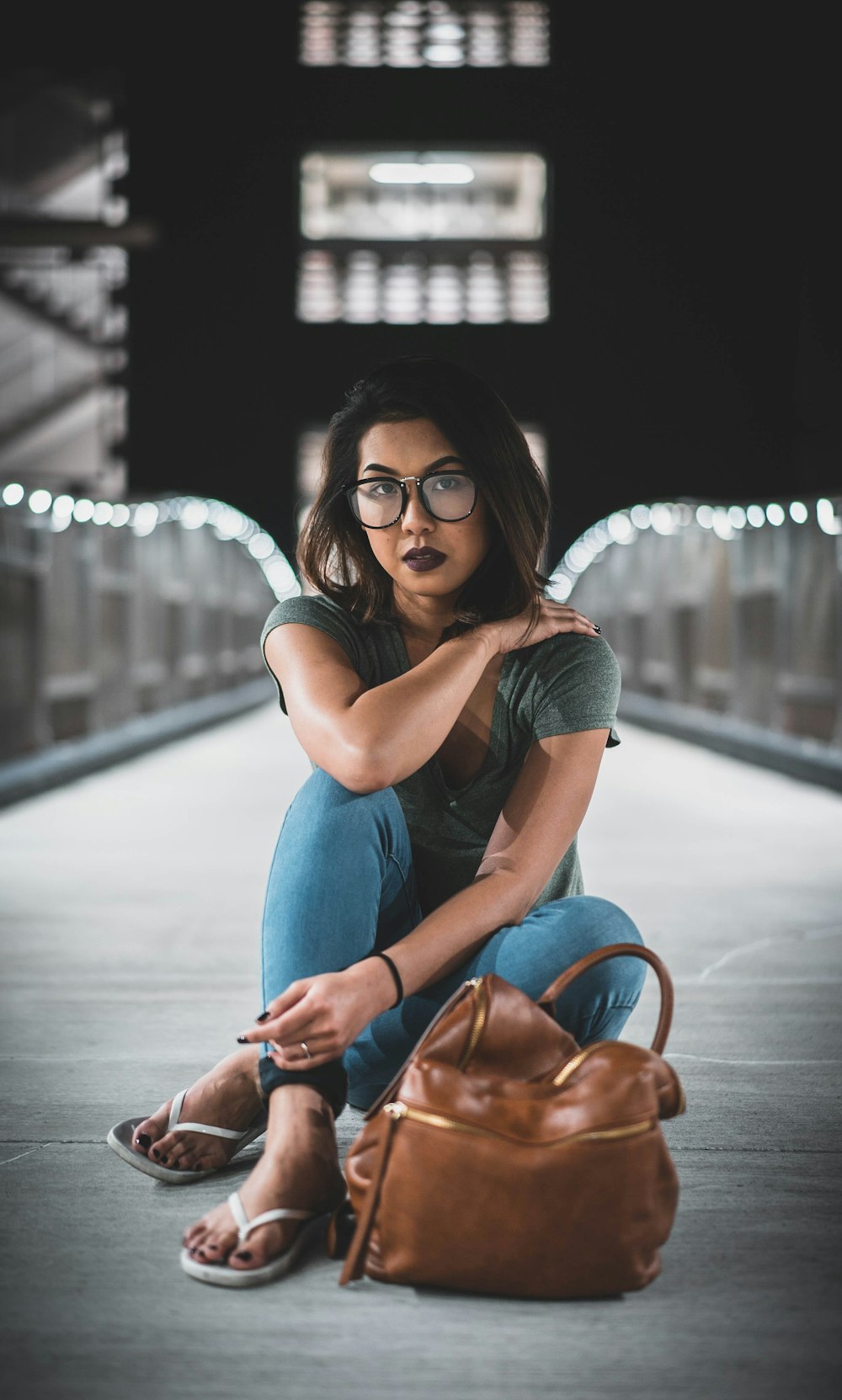 woman sitting on boat dock