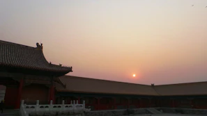 A detailed architectural rendering of Nhà ở xã hội Đông Vôi complex at sunset