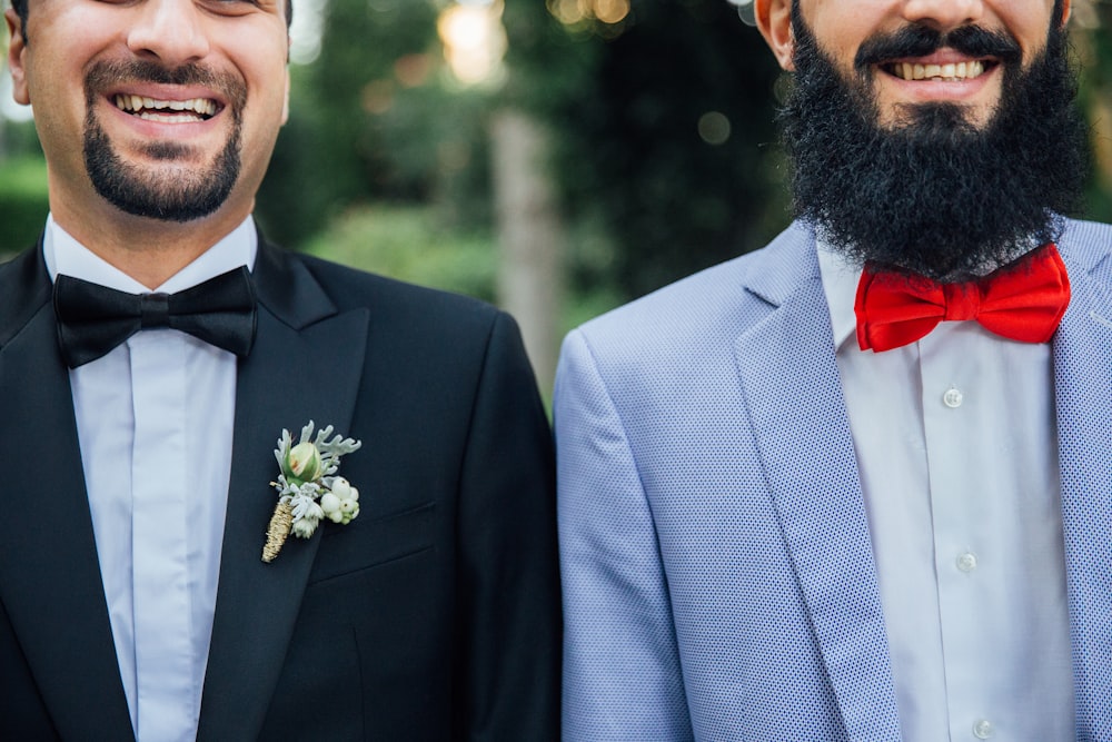 two men standing next to each other