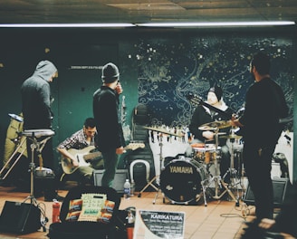 band practicing on studio