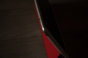 Side view of a thin tablet highlighting its slim profile and metallic finish