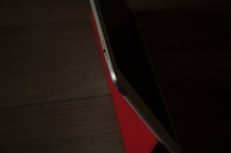 Side view of a thin tablet highlighting its slim profile and metallic finish