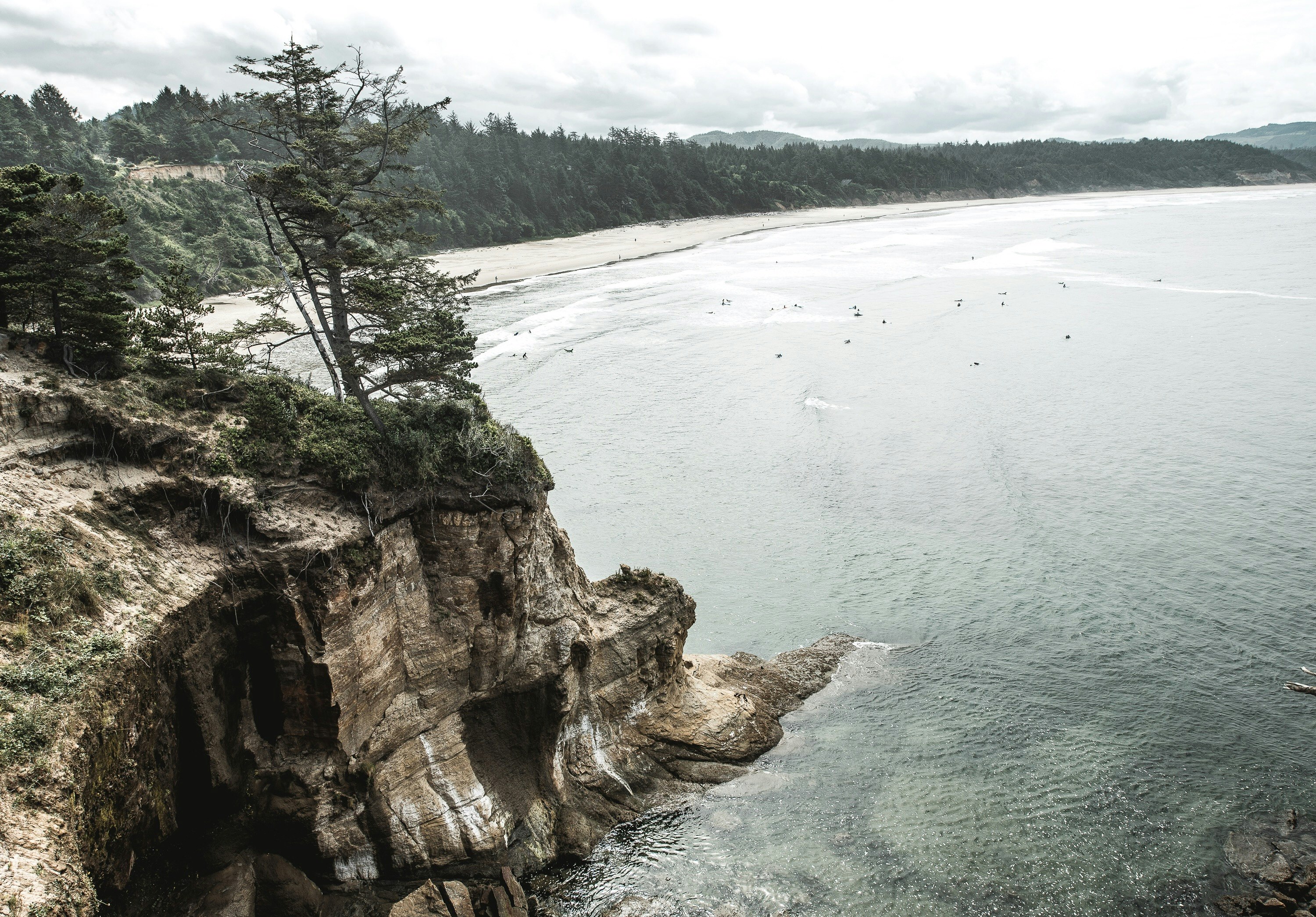 aerial photography of mountain cliff near sea