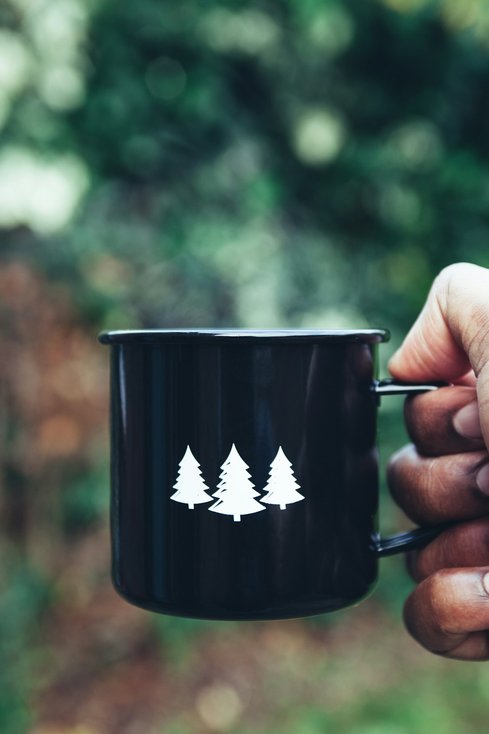 selective focus photography black and white mug